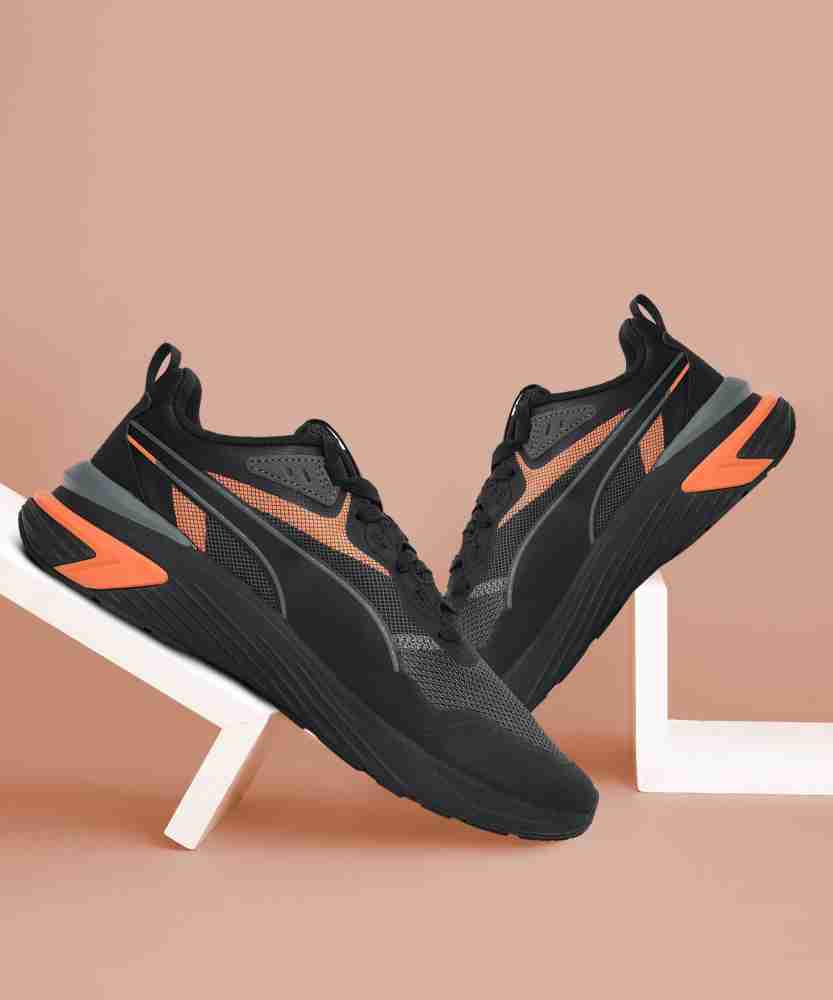 Puma black and sale orange shoes