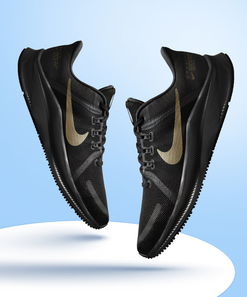 Nike quest black gold hot sale