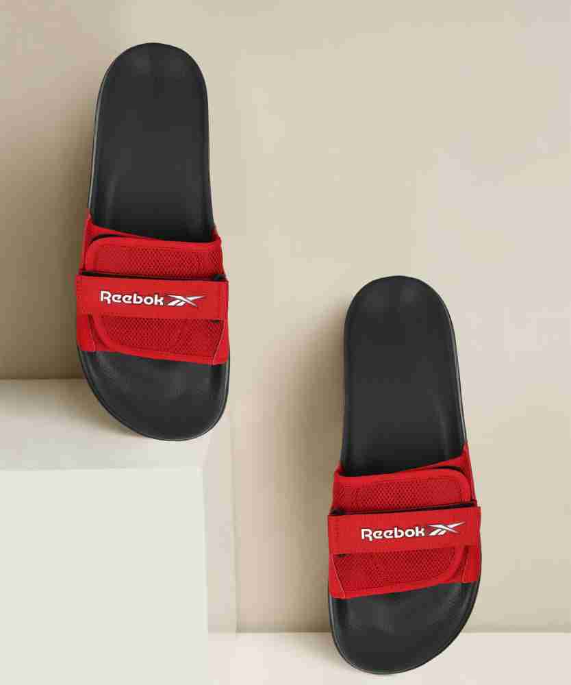 Red 2025 reebok slides