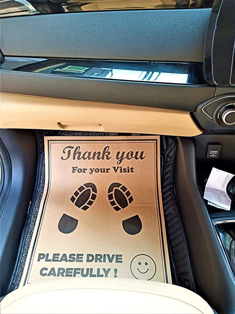 Disposable paper floor mats for shop cars