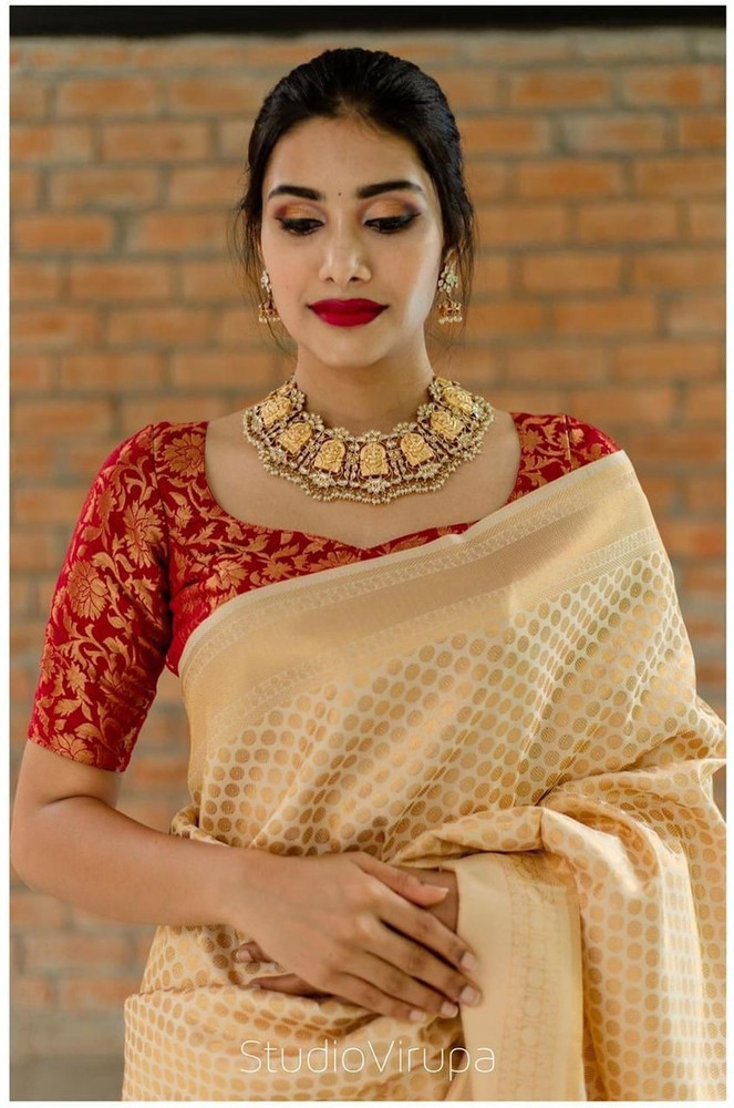 cream colour saree combination blouse