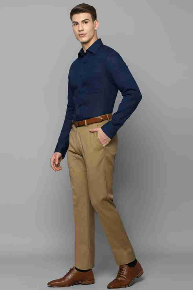 Dark blue shirt and brown pants deals