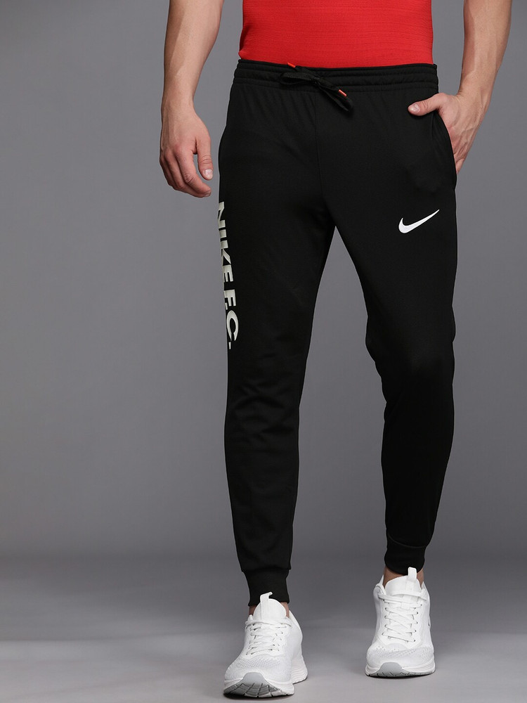 NIKE Printed Men Black Track Pants Buy NIKE Printed Men Black