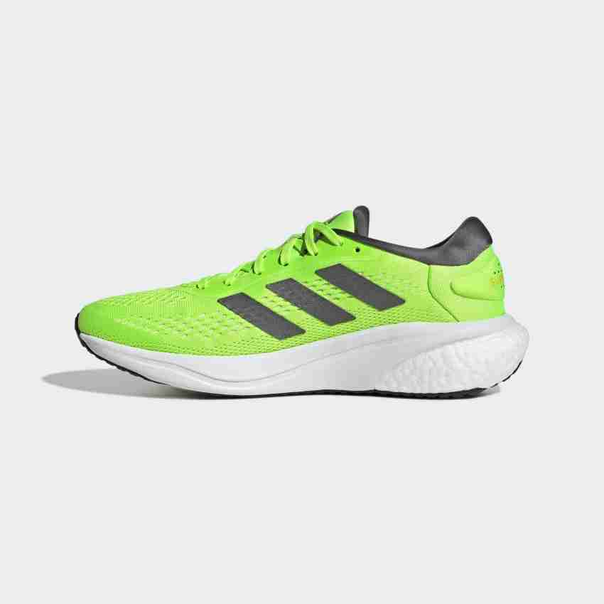 Men's supernova running shop shoes  blue/lime green