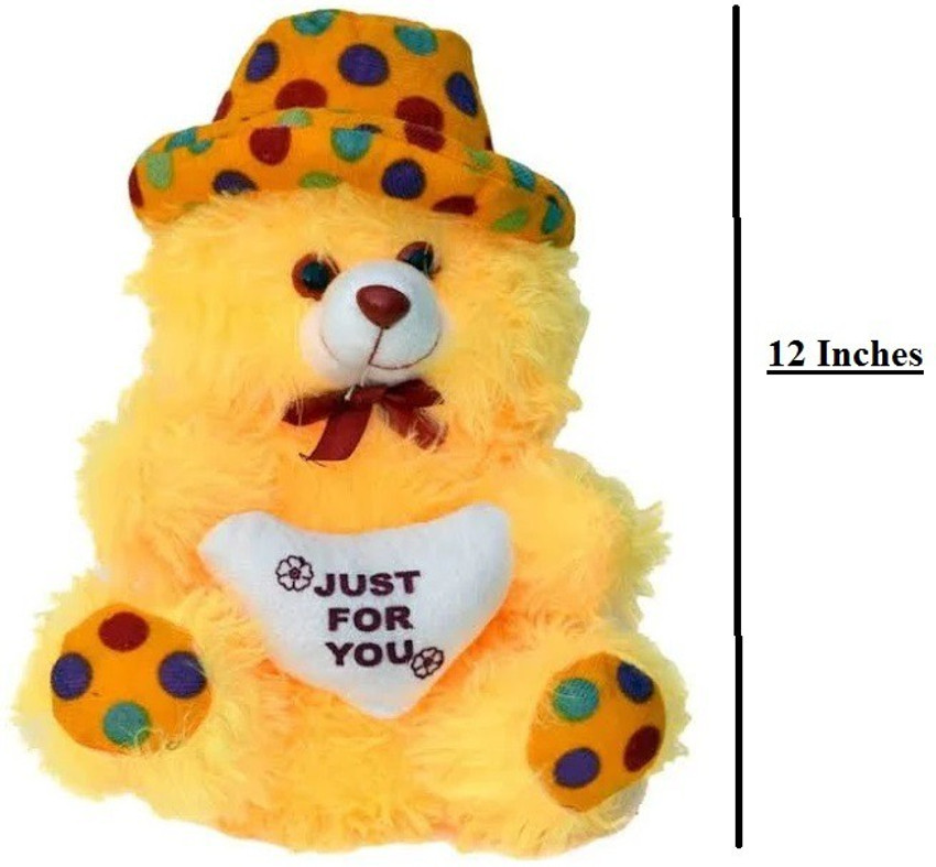 yellow teddy bear with cap