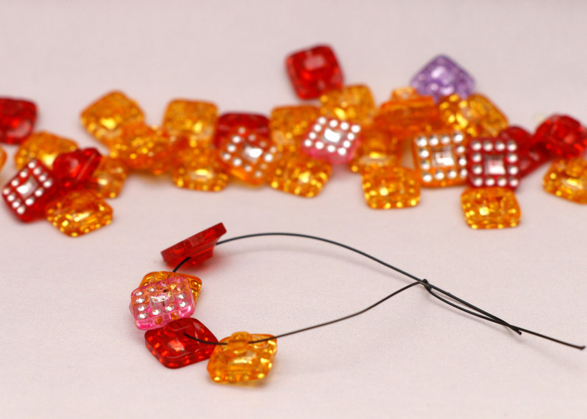 Foil top glass beads