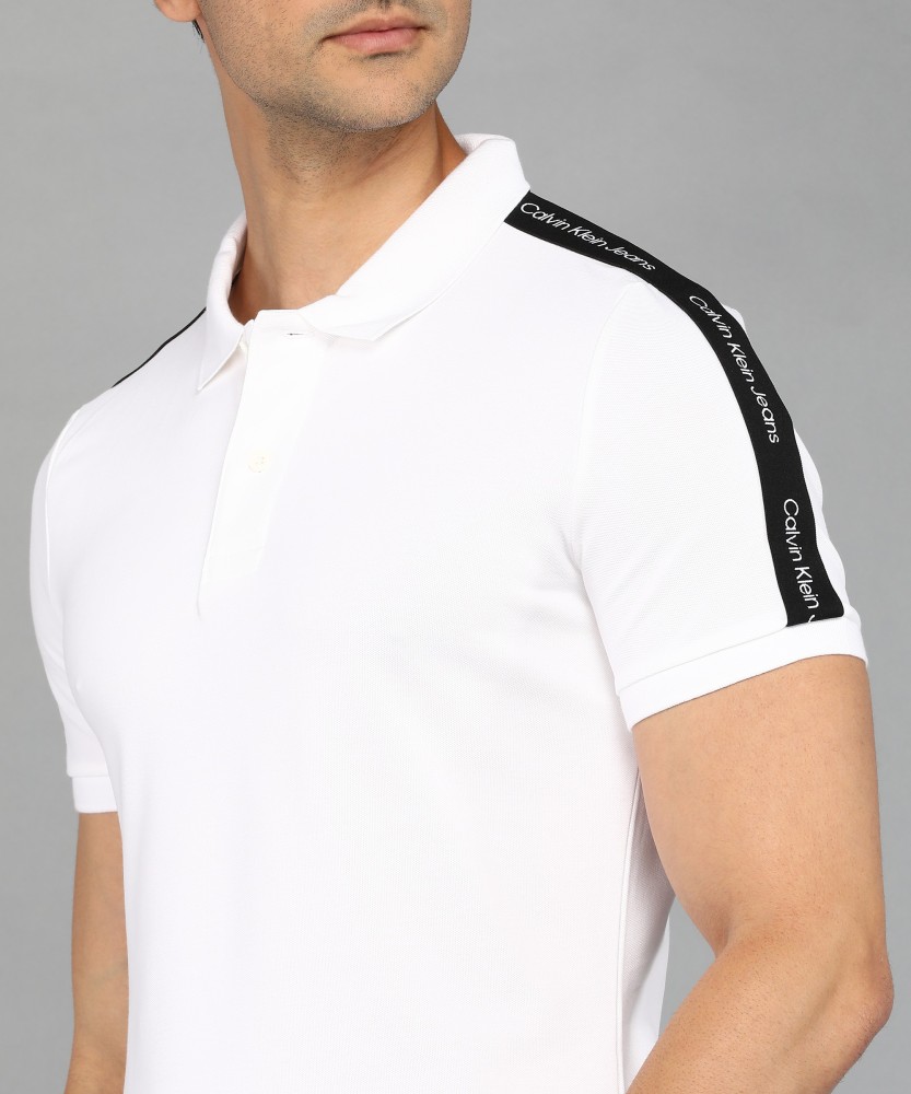 Calvin Klein Jeans Solid Men Polo Neck White T-Shirt - Buy Calvin Klein  Jeans Solid Men Polo Neck White T-Shirt Online at Best Prices in India