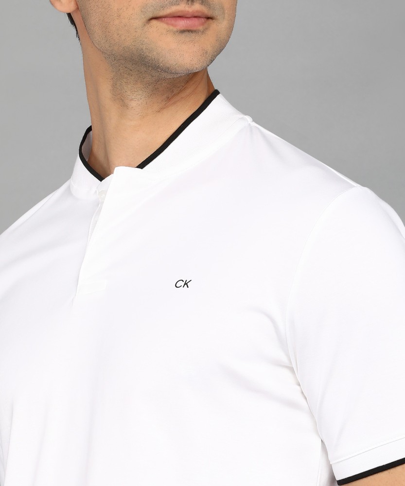 Calvin Klein Jeans Solid Men Polo Neck White T-Shirt - Buy Calvin Klein  Jeans Solid Men Polo Neck White T-Shirt Online at Best Prices in India