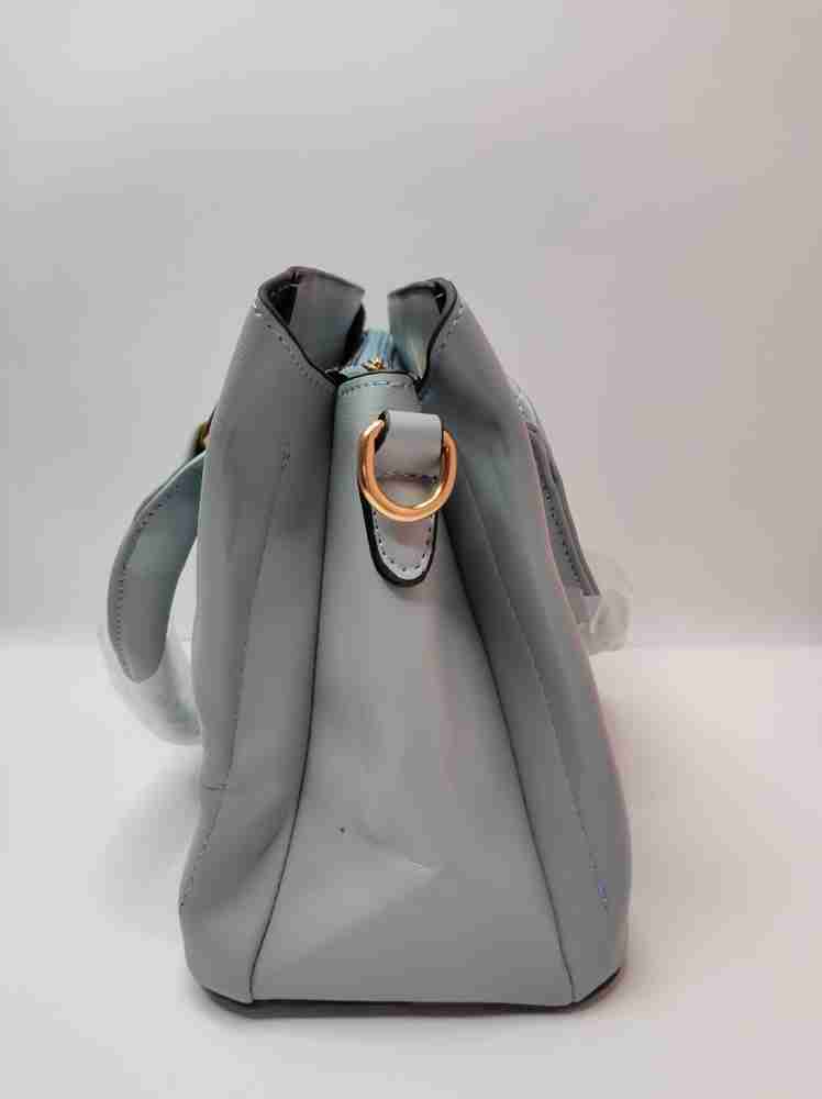 Flipkart WEE Handbag for ladies with long belt and pom pom