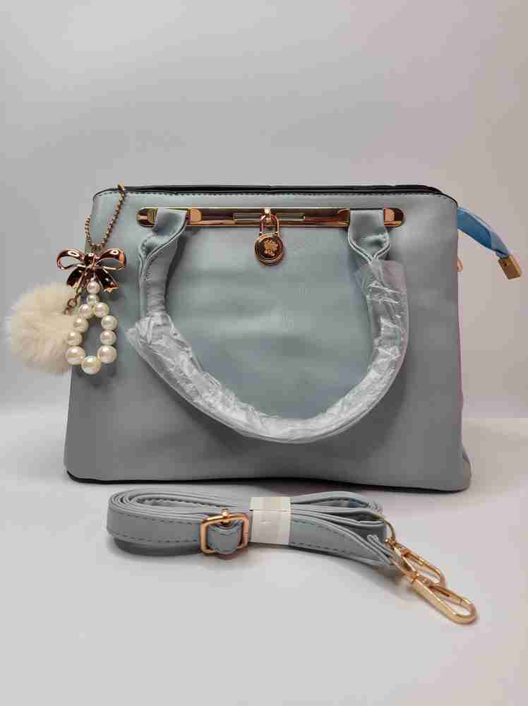 Flipkart WEE Handbag for ladies with long belt and pom pom