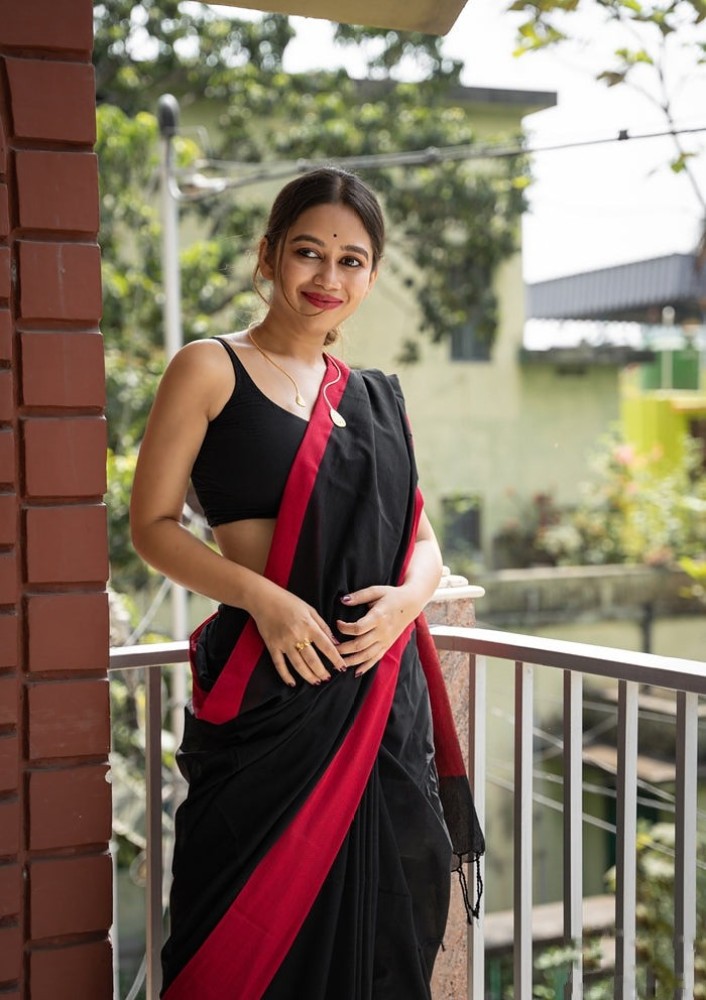 Black saree with on sale red blouse