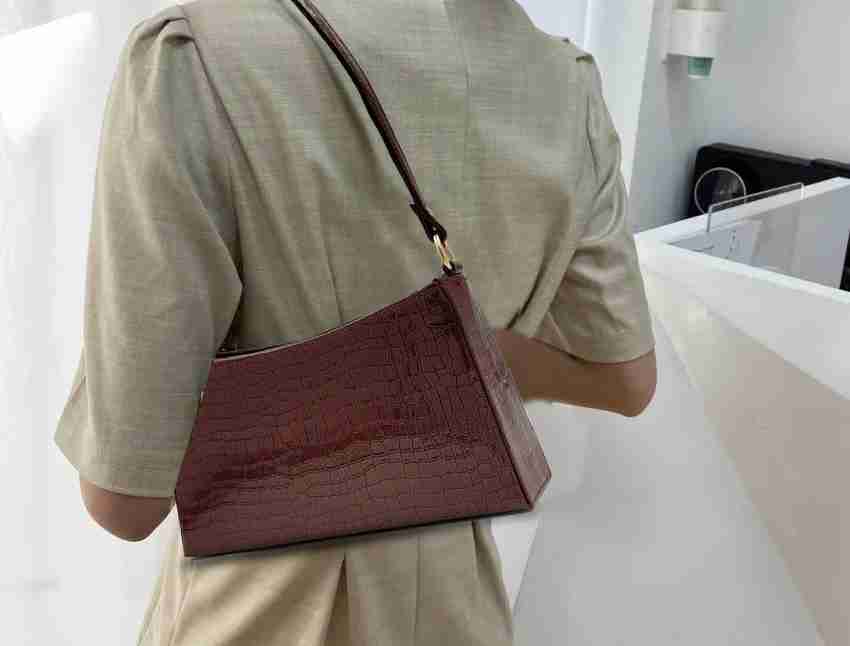 Baguette bag in burgundy croco-like leather