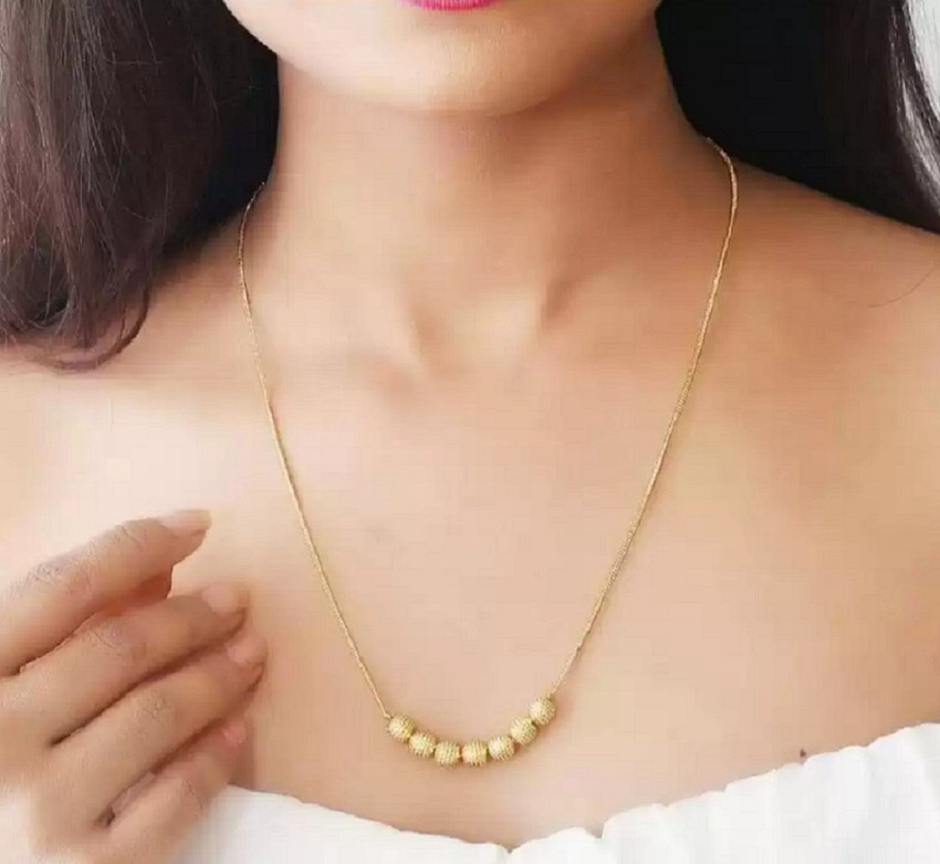 Gold moti locket discount