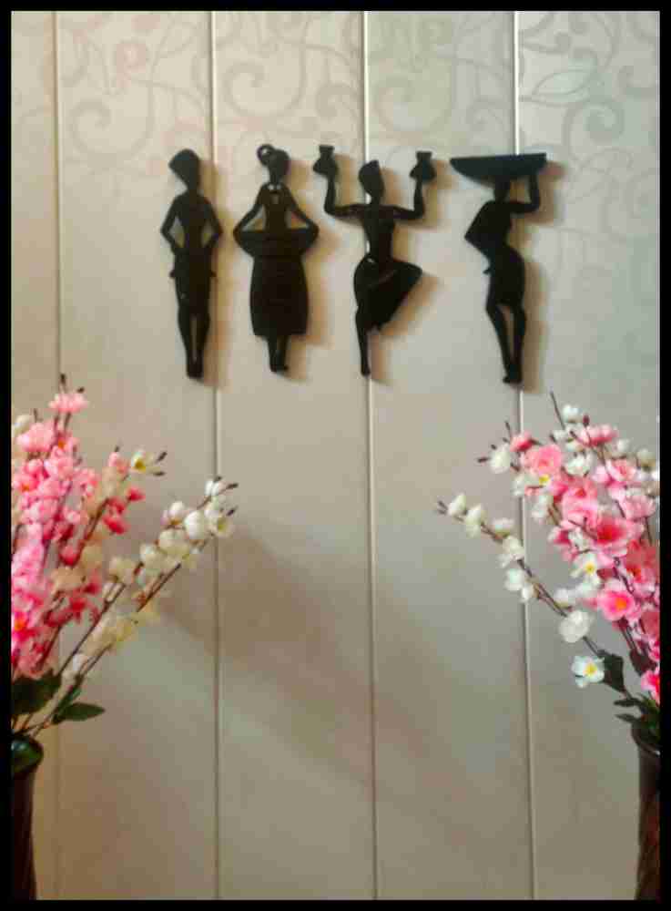Hanging dolls on clearance wall