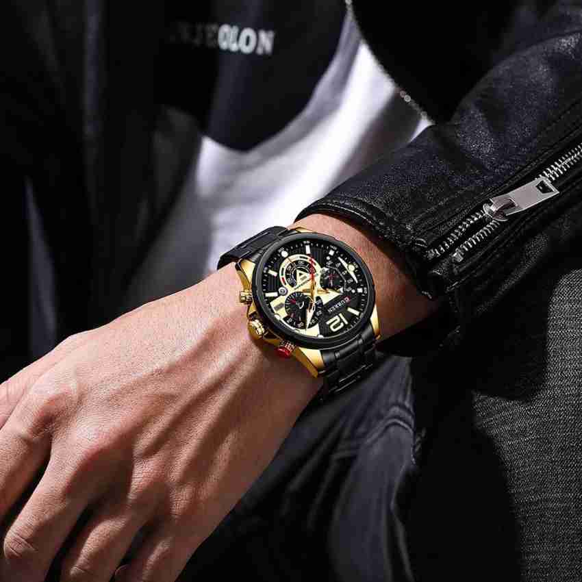 Curren black best sale gold watch