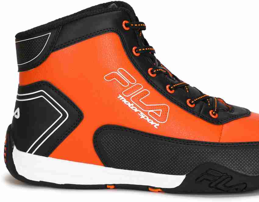 Orange fila shoes top