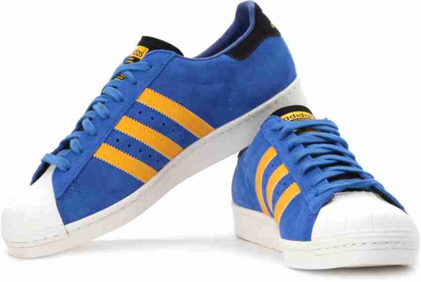 Adidas originals blue and sales yellow