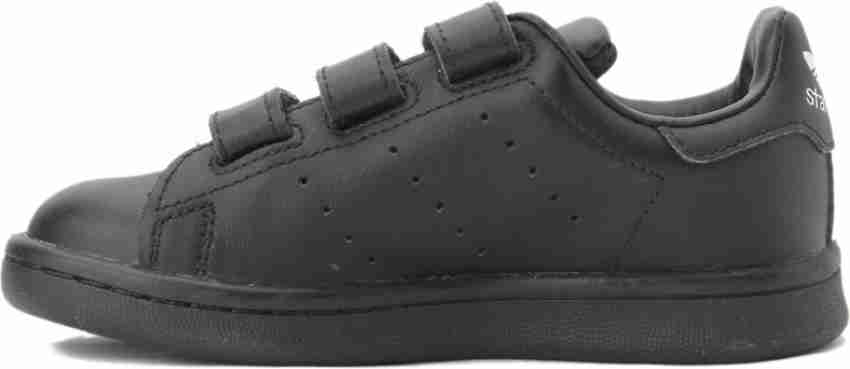 Stan smith hotsell black scratch