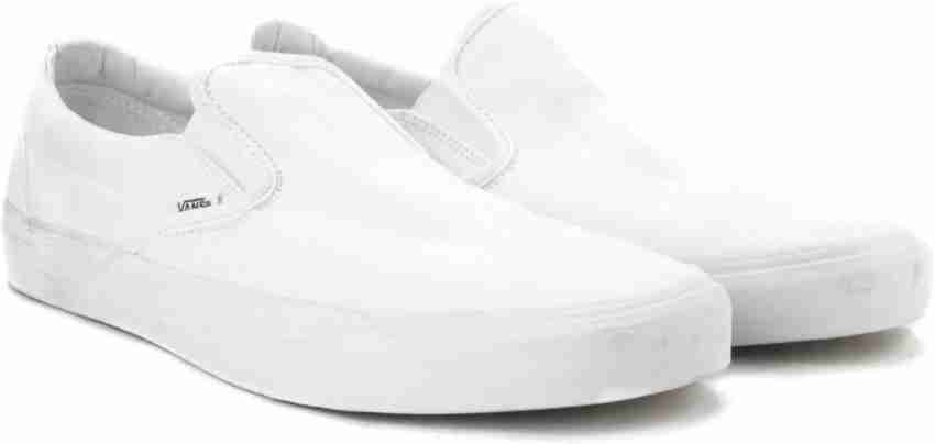 All white best sale slip on vans