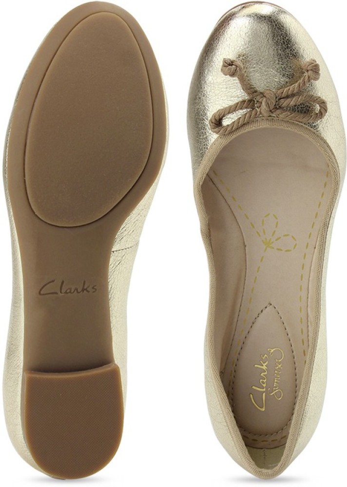 Clarks store gold shoes