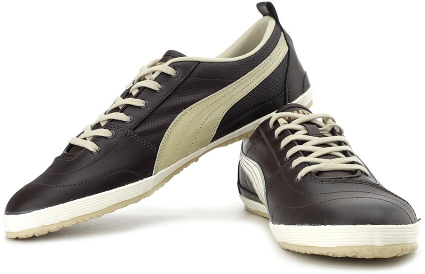 Black and outlet gold pumas khaki