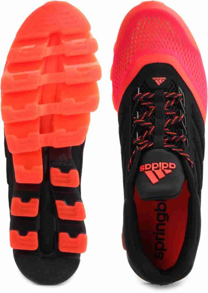 Adidas springblade black and orange price hotsell