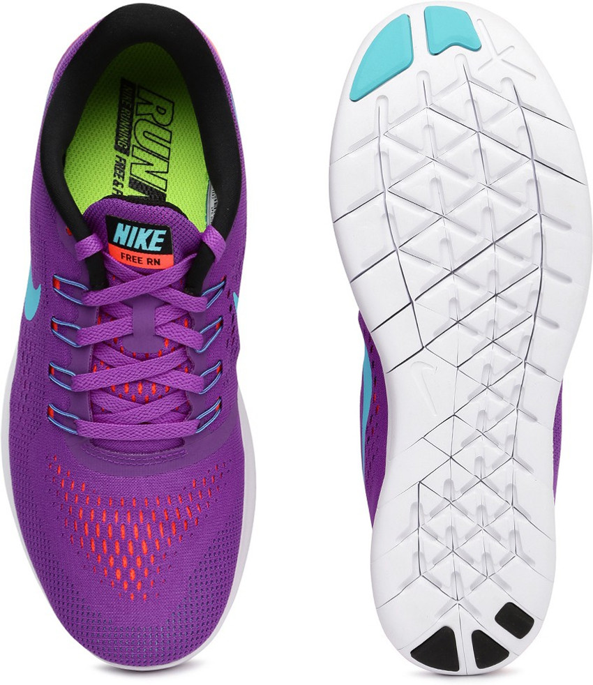 Nike purple and hot sale black running shoes