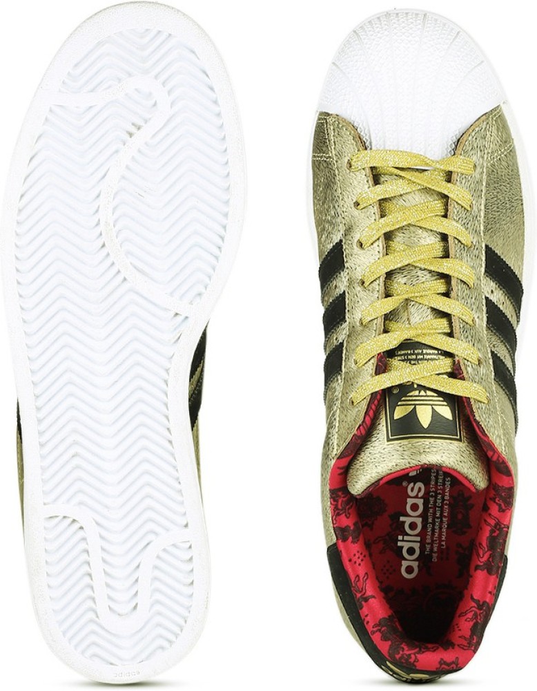 Adidas superstar best sale snake gold