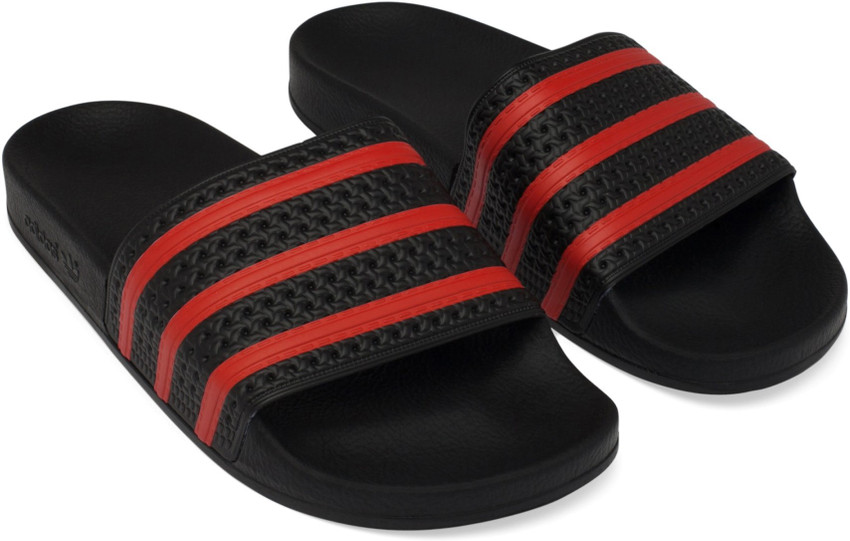 orange adidas flip flops