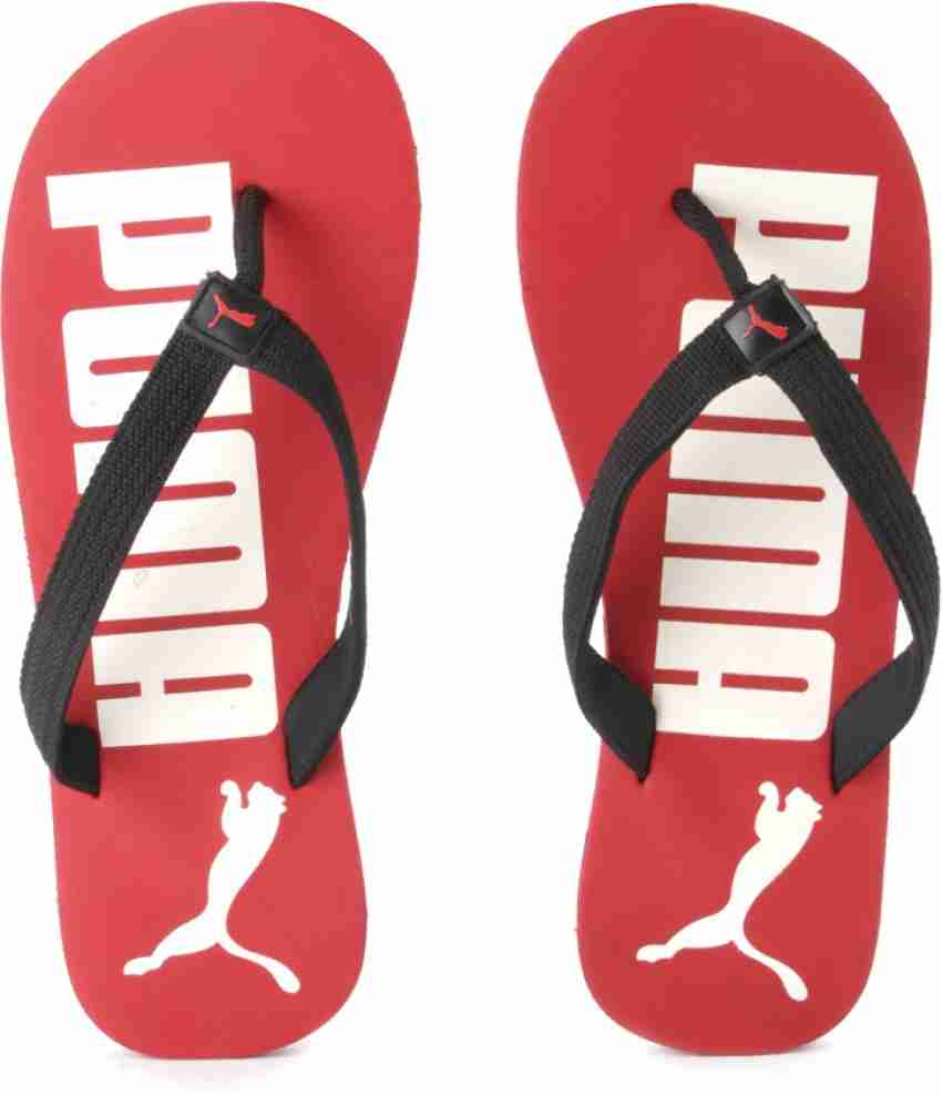 Puma red and 2025 black flip flops