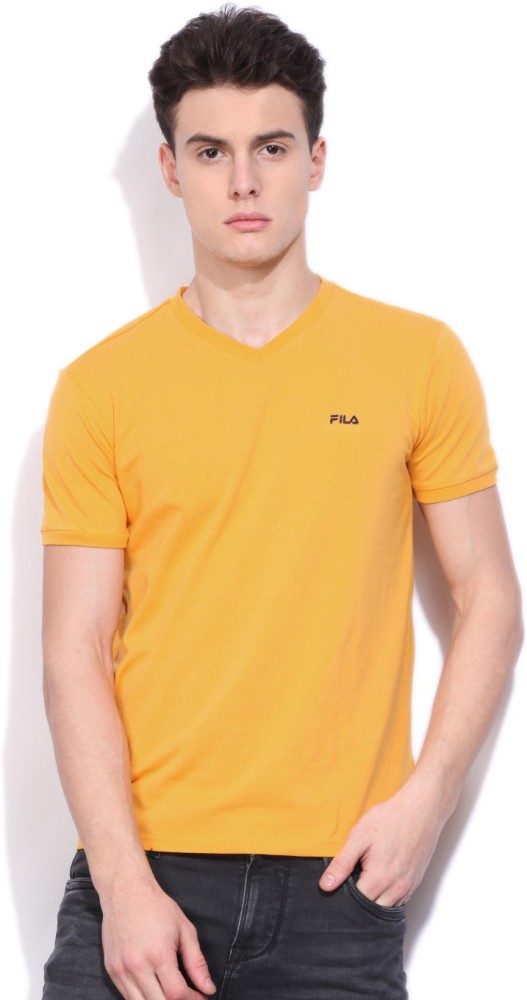 FILA Solid Men V Neck Yellow T Shirt Buy ARTISANS GOLD FILA Solid Men V Neck Yellow T Shirt Online at Best Prices in India Flipkart