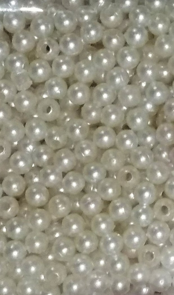 White plastic top beads
