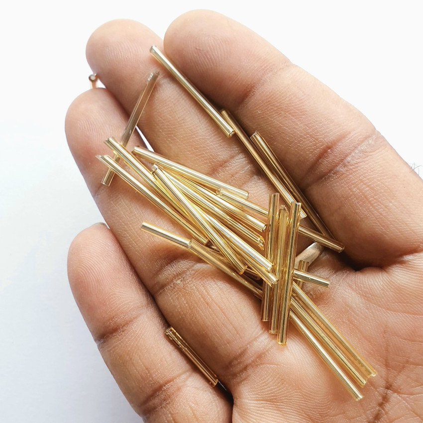 SK ART GALLERY Size Approx 24mm gold long glass tube beads 1 tube nylon thread Size Approx 24mm gold long glass tube beads 1 tube nylon thread Buy 24mm long glass tube beads toys in India. shop for SK...