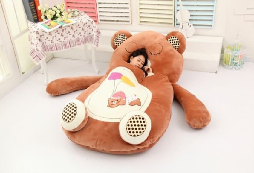 bed with teddy bear