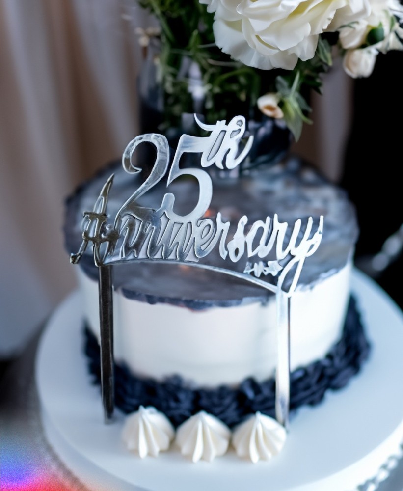 What is written on anniversary cake?