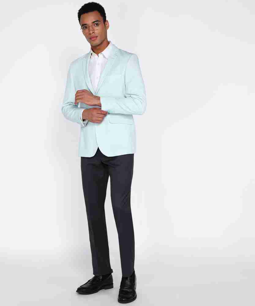 Light blue blazer store with white shirt