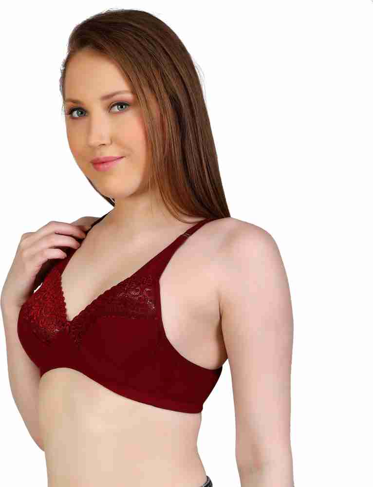 Premium Photo  Lacy bra on red background