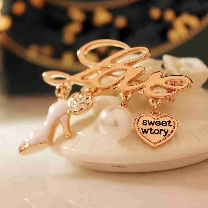 Charm brooch on sale