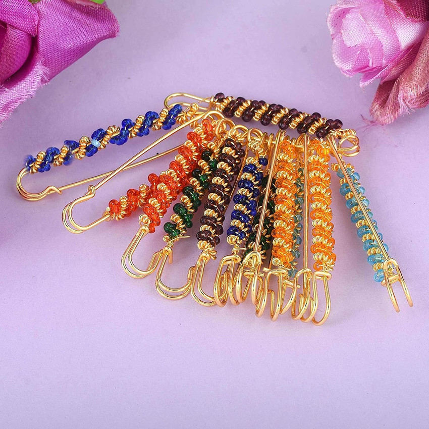 Fancy brooches top pins