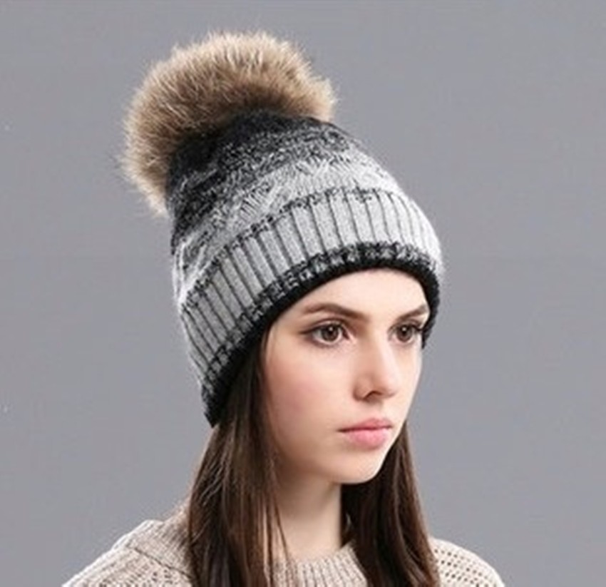 Cap with fur ball best sale on top