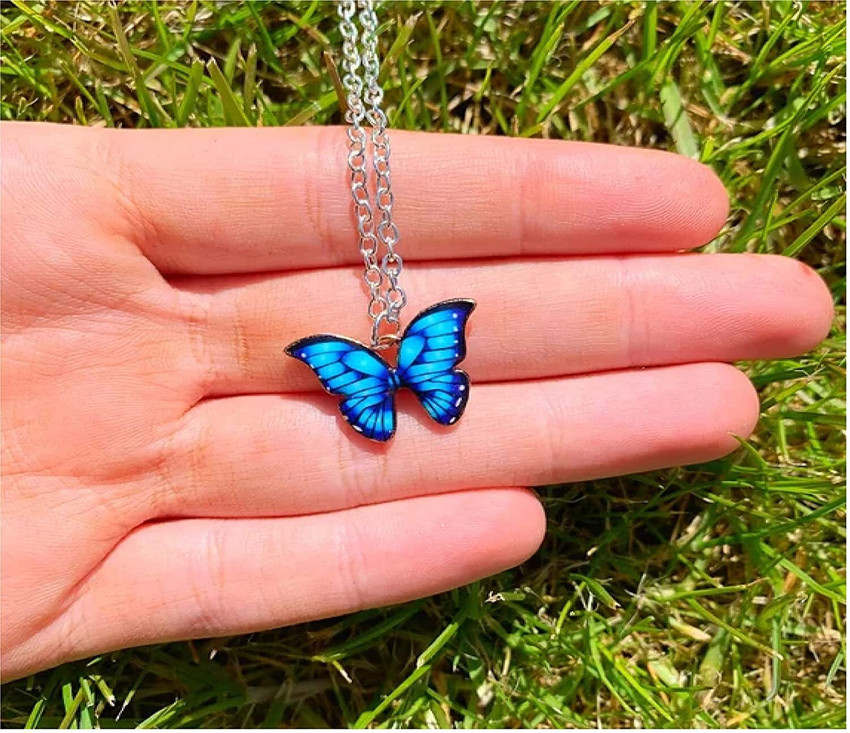 Blue butterfly charm top
