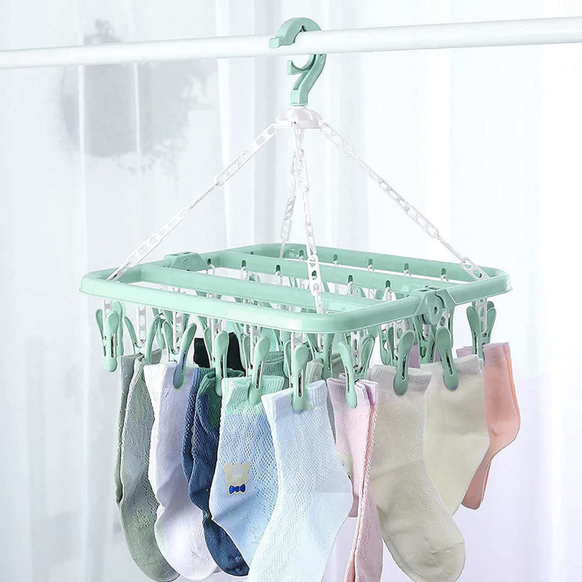 Plastic stand for drying clothes shop