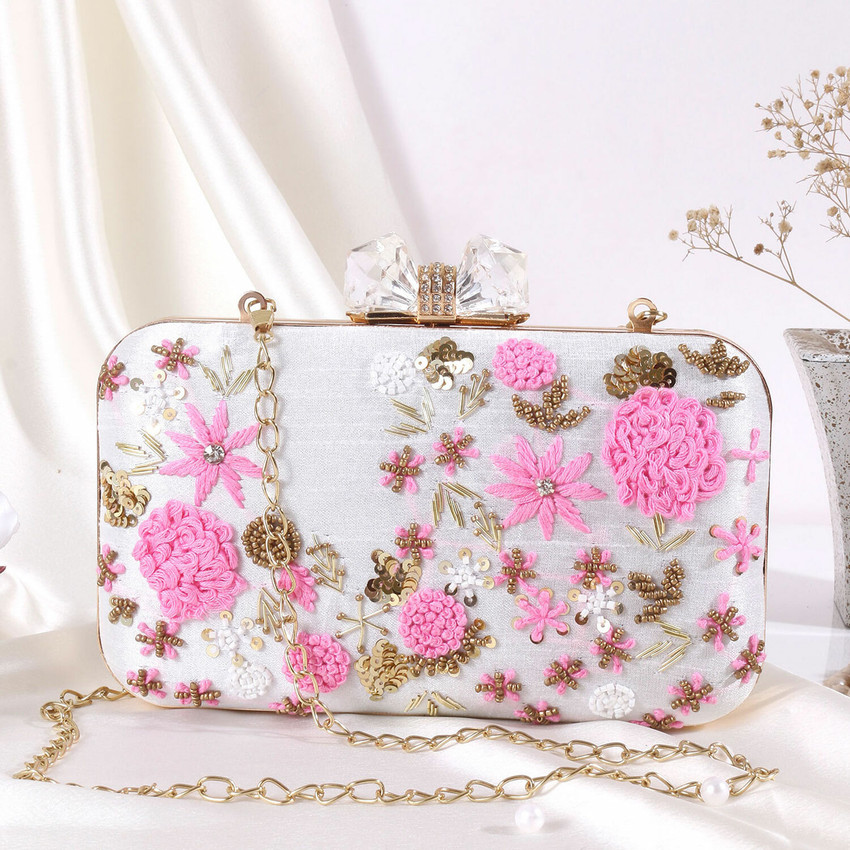Pink and white shop clutch bag