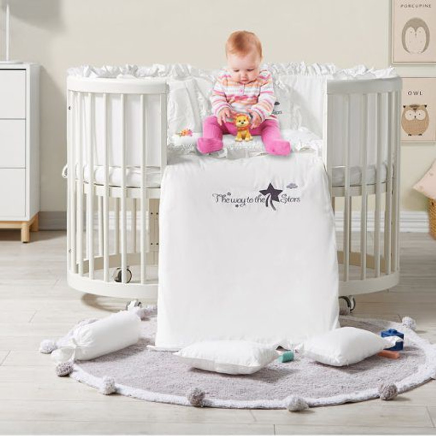 Round wooden shop cot