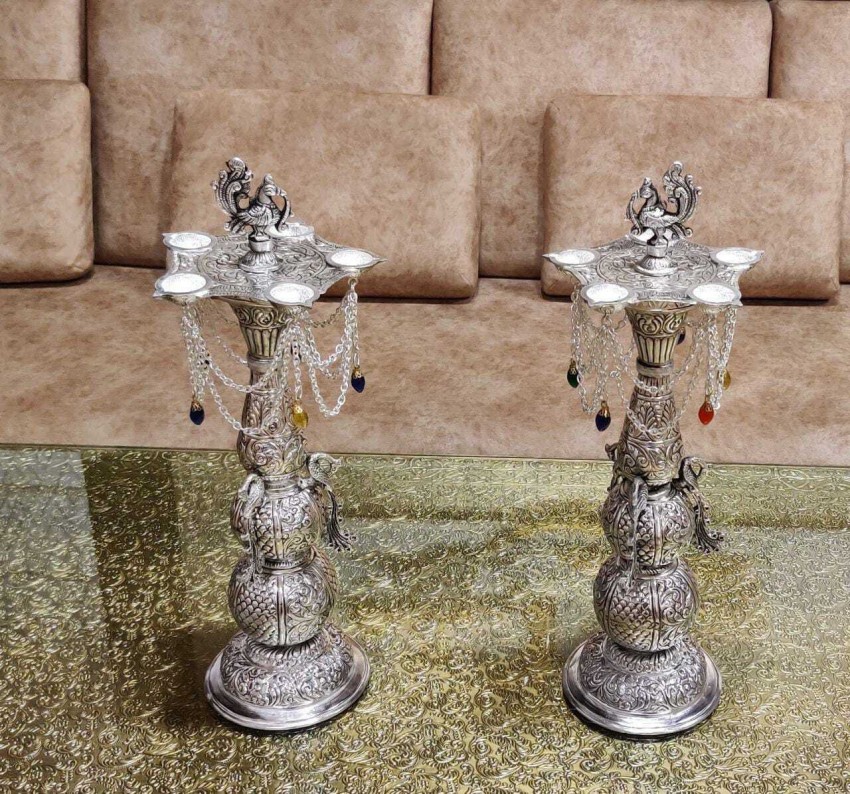 Pair of Engraved Brass Peacock Candle Holders