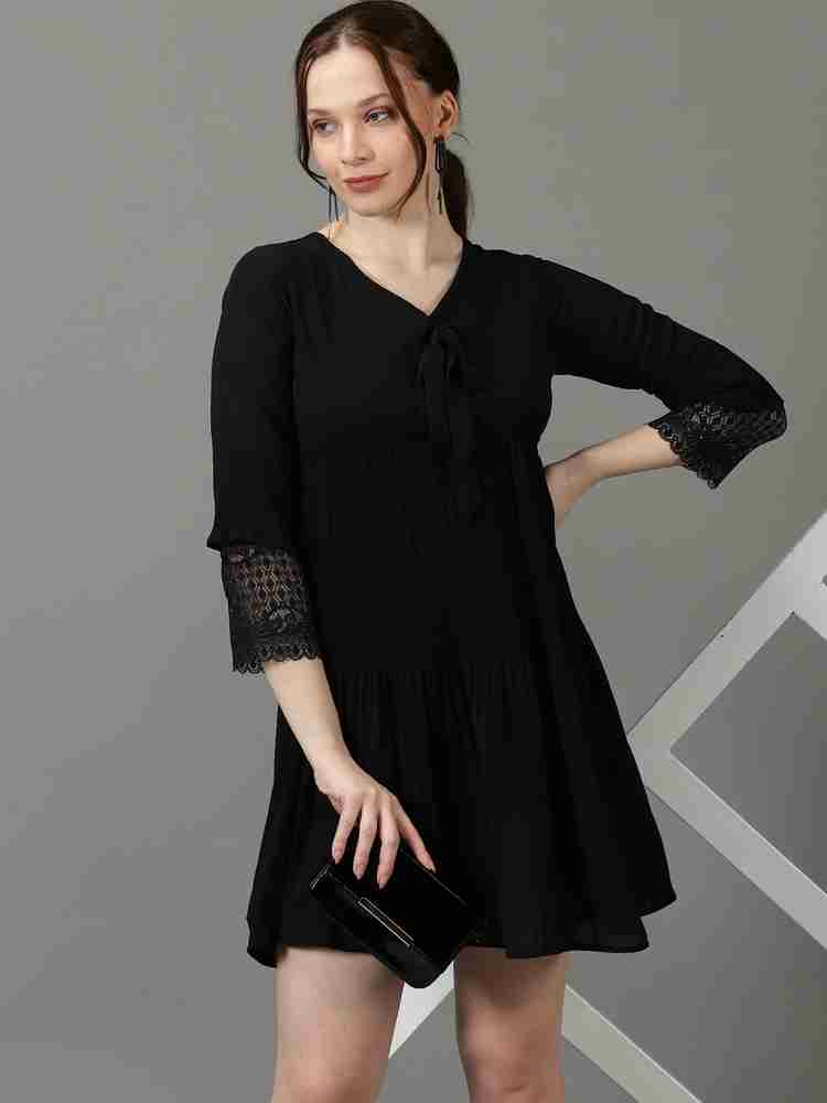 Black fit and sales flare dress with sleeves