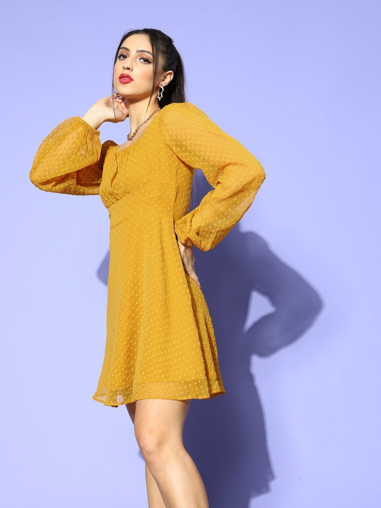 Buy DressBerry Women Black & Mustard Yellow Self-Design Fit and Flare Dress  on Myntra