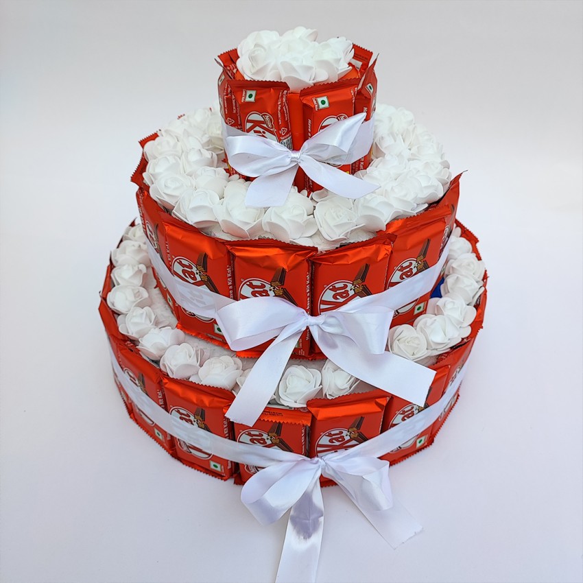 Kit kat chocolate hampers with white roses  Zupppy