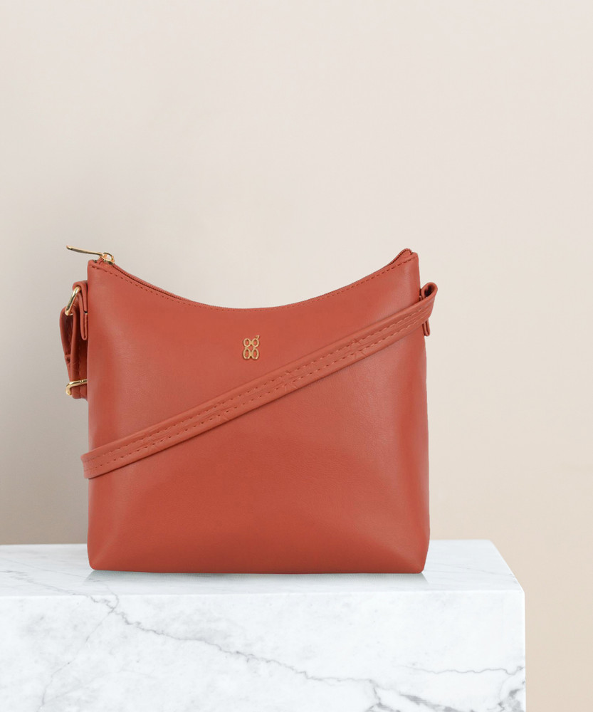 Baggit red sling bag best sale