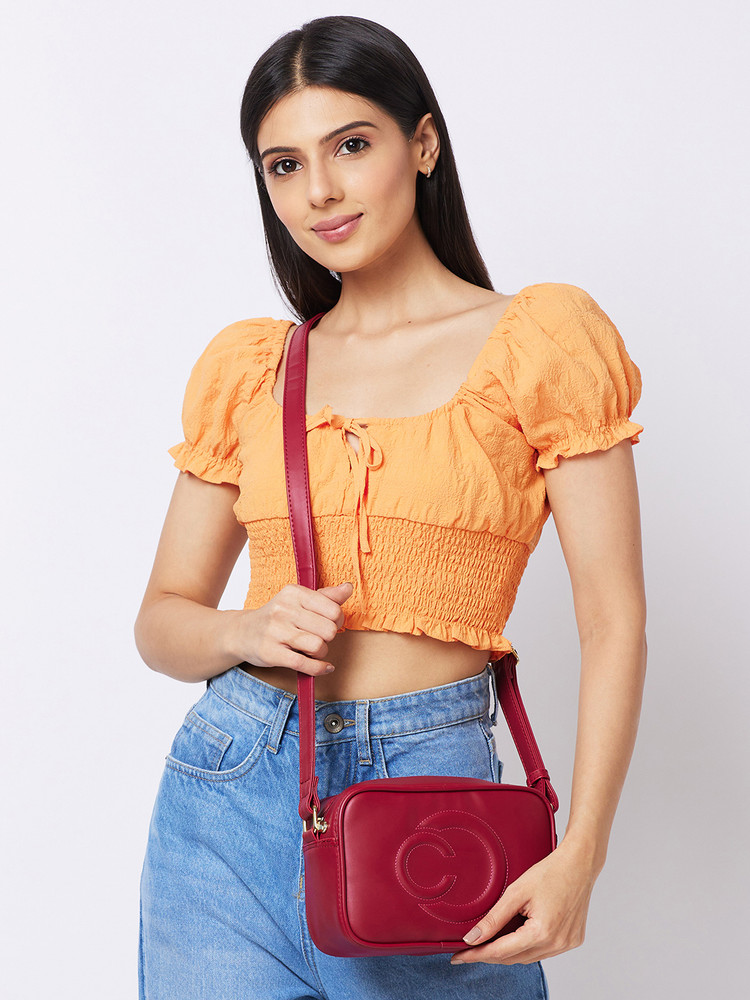 Caprese burgundy solid shoulder bag sales